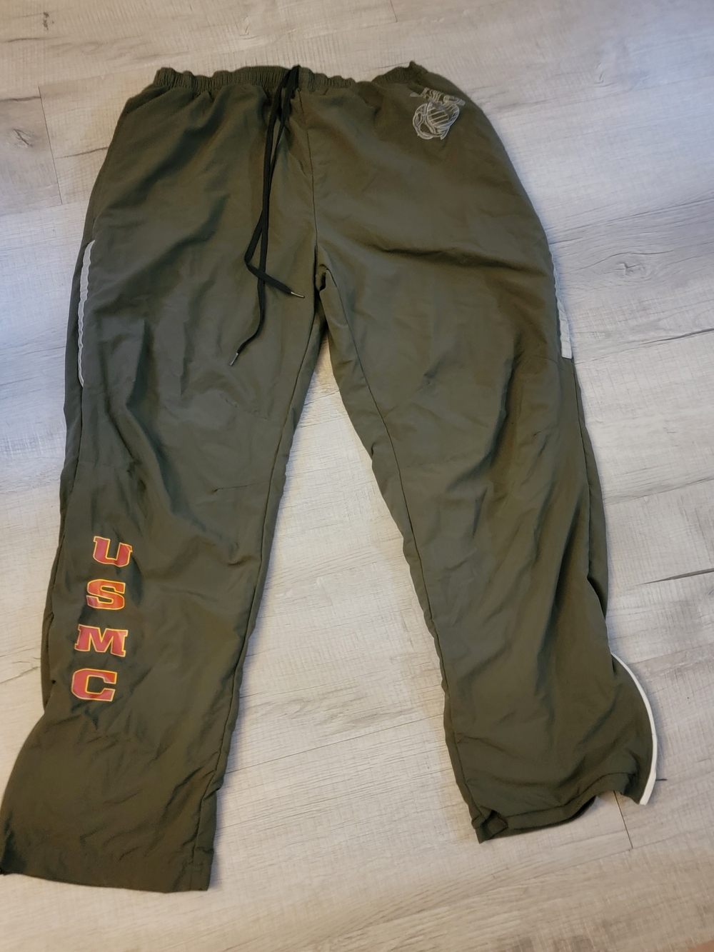 New Balance Olive Green Men's Jogger Pants with Red/Yellow Lettering